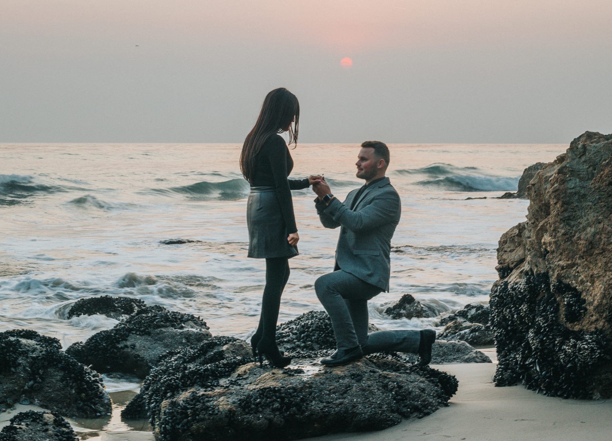 Man proposing a beautiful piece of borrego fine jewelry to his fiancee
